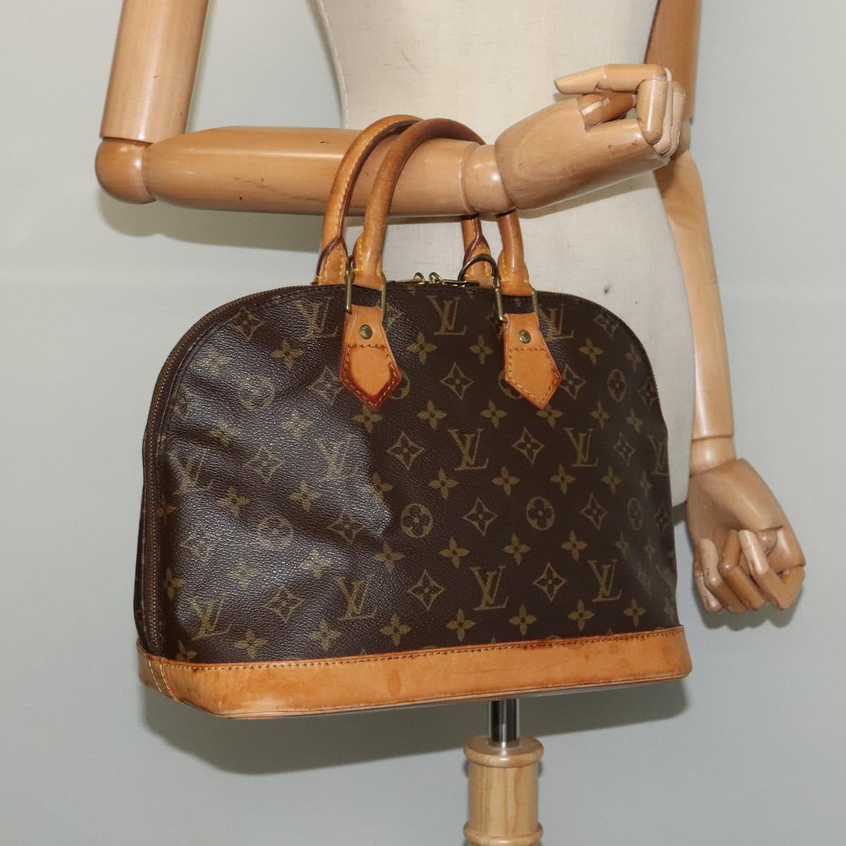 Monogram Alma Hand Bag